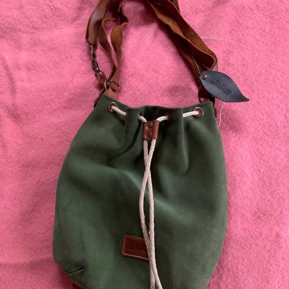 Gorgeous one of a kind bag from Spain. Dark green suede with dark brown straps